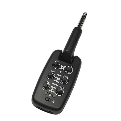 M-VAVE MINI-X guitar headphone amp connected to guitar